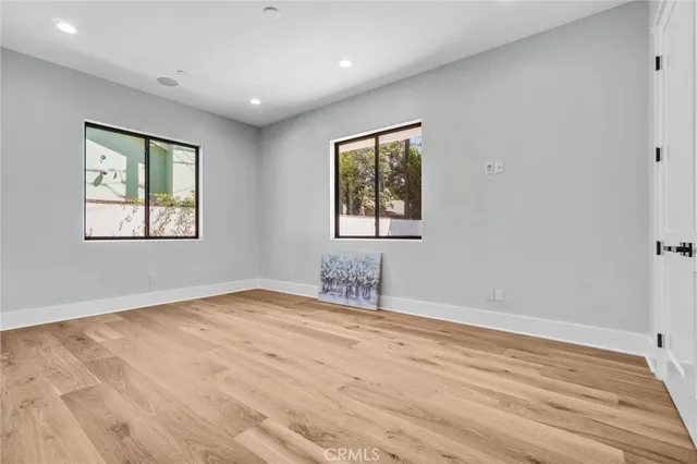 a bathroom with a shower sink vanity and mirror
