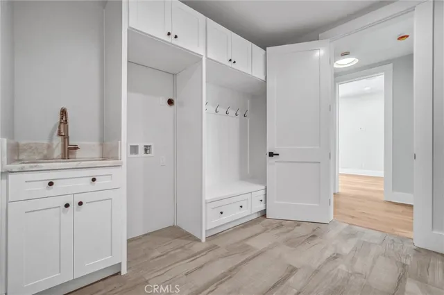 a view of a room with wooden walls