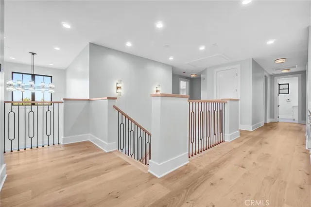 an aerial view of a house with a swimming pool