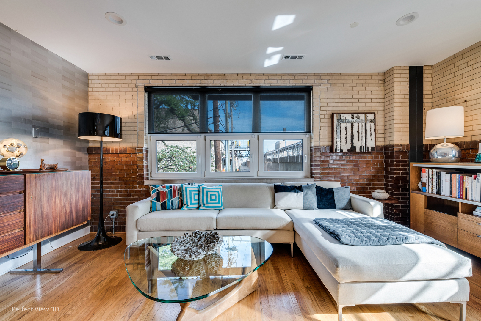 1128 West Ardmore Avenue, Unit 1 Chicago, IL 60660 - Photo 11 of 31 a living room with furniture and a flat screen tv
