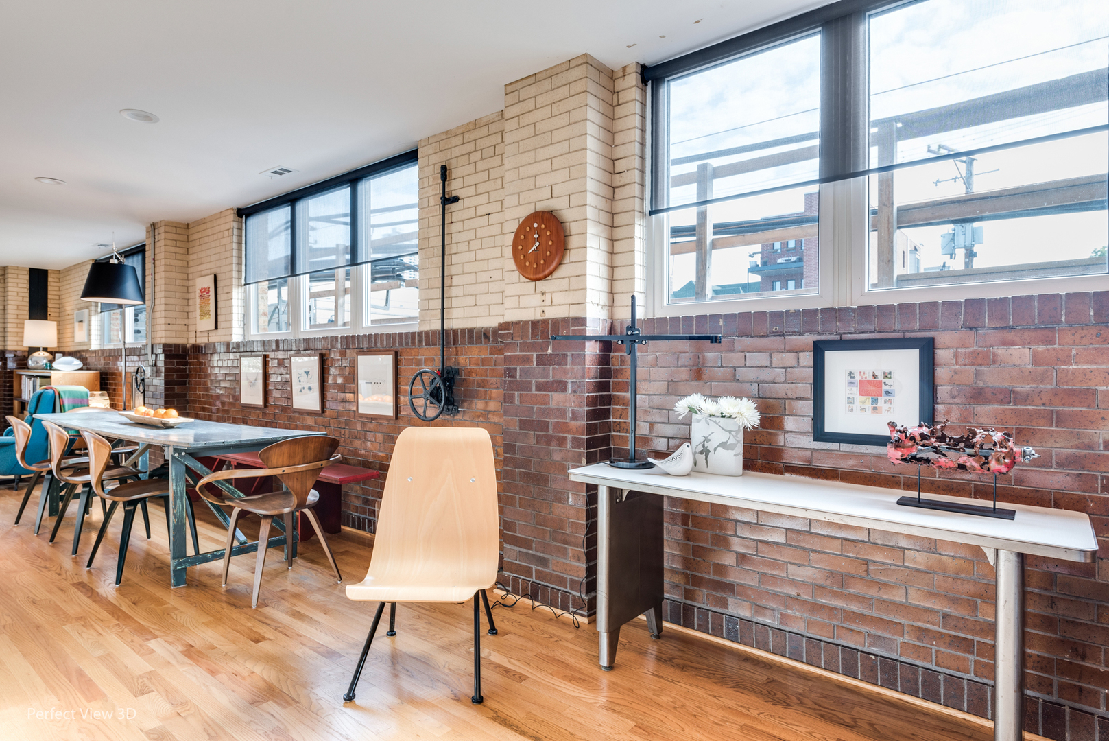1128 West Ardmore Avenue, Unit 1 Chicago, IL 60660 - Photo 3 of 31 a dining room with furniture and a floor to ceiling window