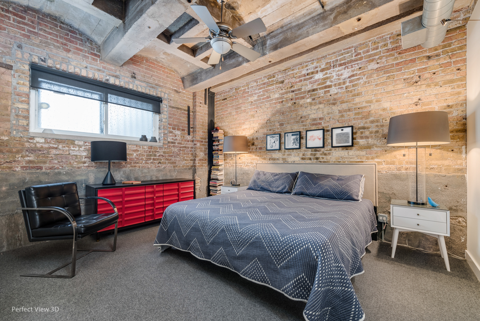 1128 West Ardmore Avenue, Unit 1 Chicago, IL 60660 - Photo 21 of 31 a bedroom with a bed and a chair with the outer view