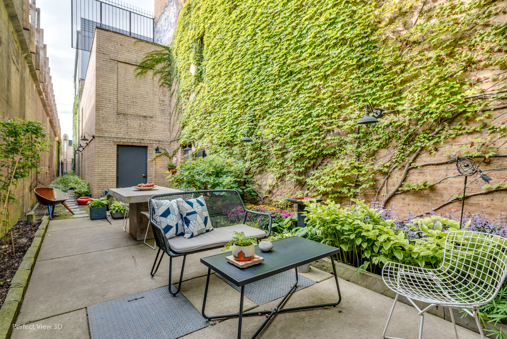 1128 West Ardmore Avenue, Unit 1 Chicago, IL 60660 - Photo 25 of 31 a backyard of a house with lots of green space and outdoor seating