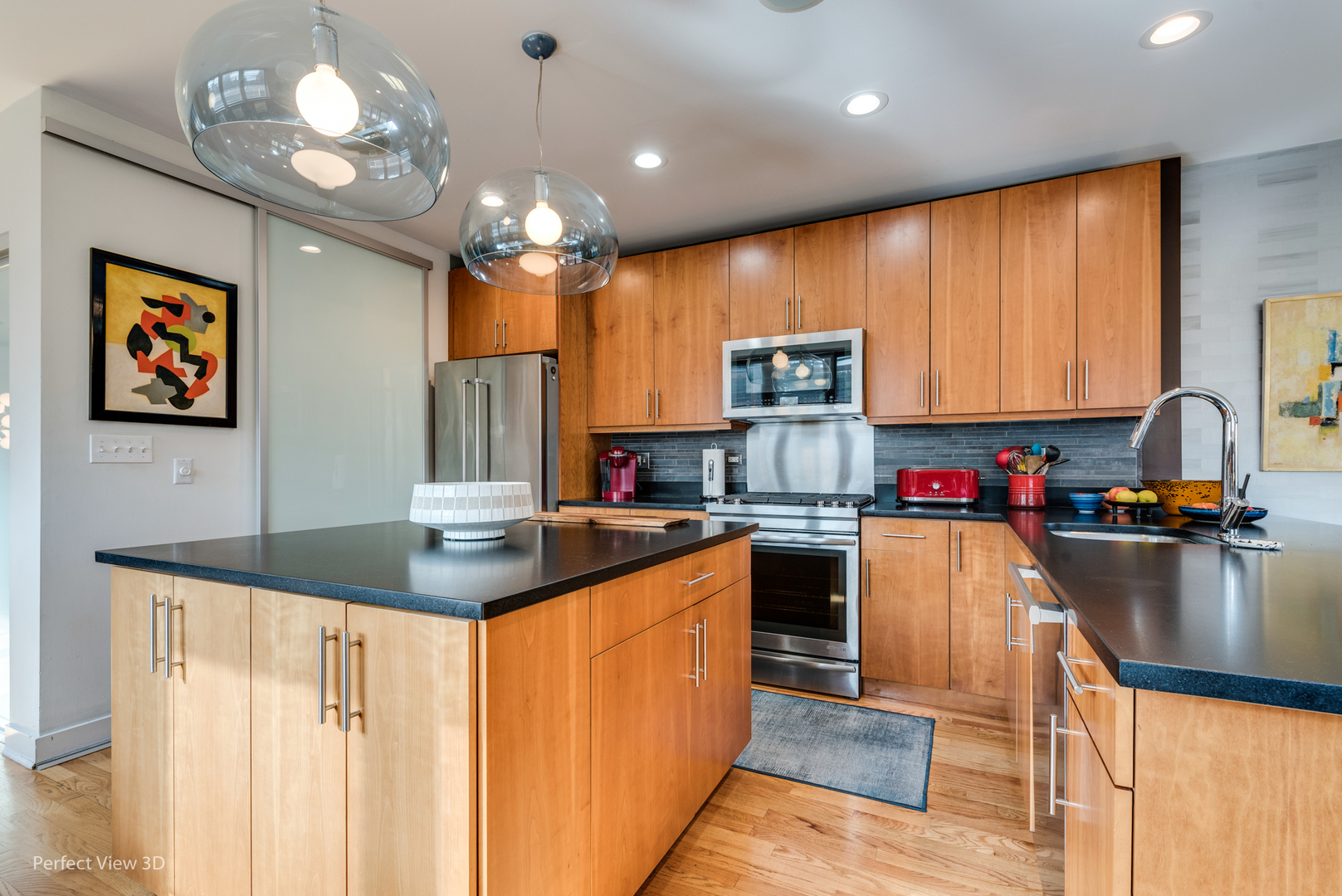 1128 West Ardmore Avenue, Unit 1 Chicago, IL 60660 - Photo 9 of 31 a kitchen with stainless steel appliances granite countertop a sink stove and refrigerator