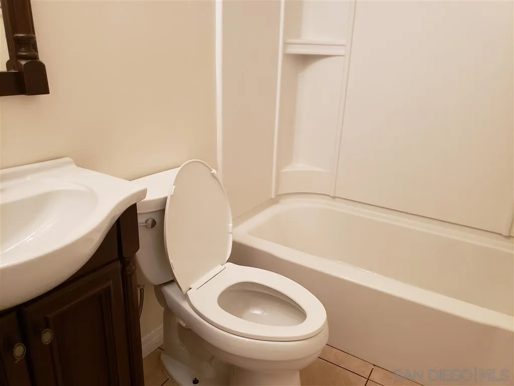 13425 Hilldale Road Valley Center, CA 92082 - Photo 11 of 13 a bathroom with a sink and a toilet