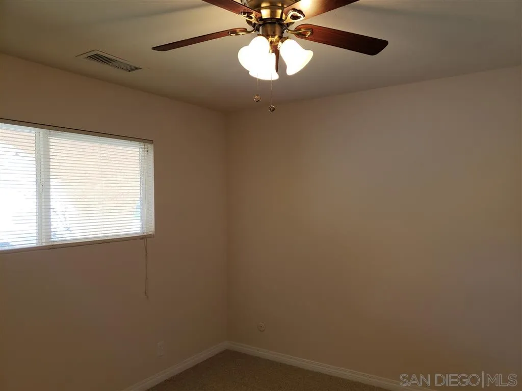 13425 Hilldale Road Valley Center, CA 92082 - Photo 10 of 13 an empty room with a window