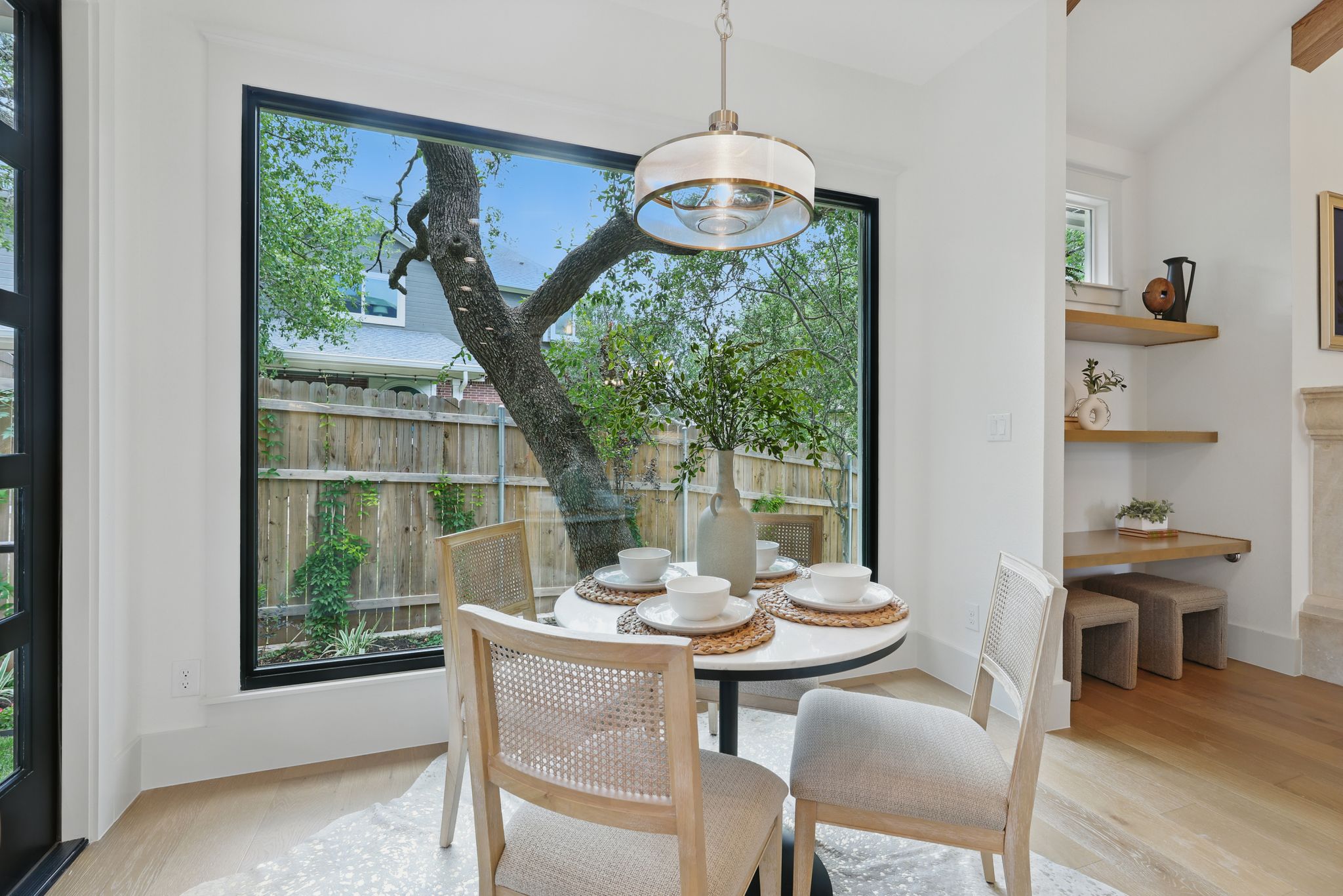 6905 Rudi Cove Austin, TX 78759 - Photo 13 of 36 a view of a dining room with furniture window and outside view