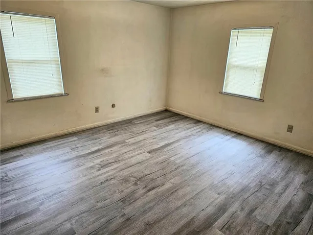 a view of a yard with a tree