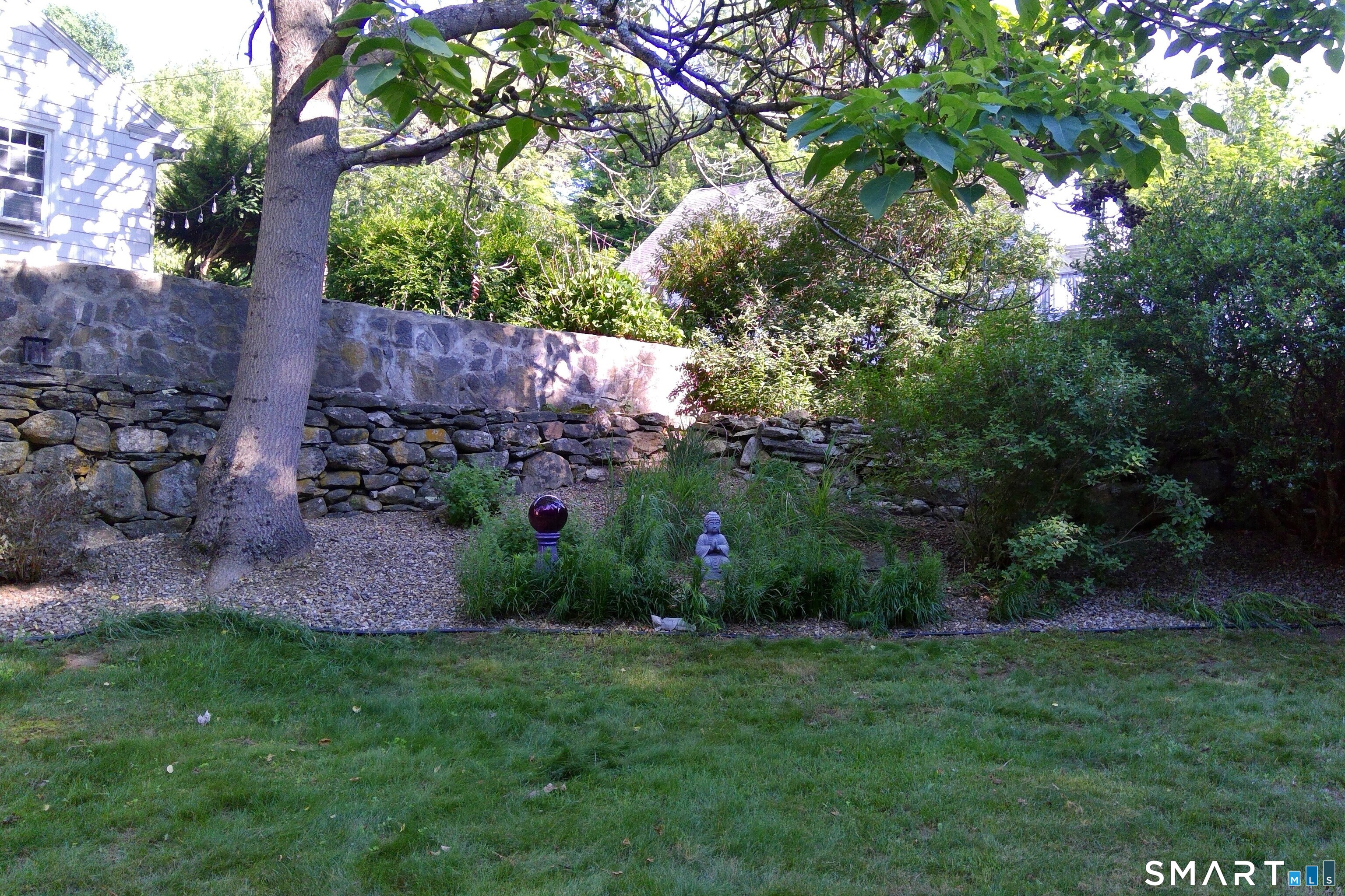 46 Station Road Windham, CT 06256 - Photo 30 of 34 View of stone patio and landscaped area