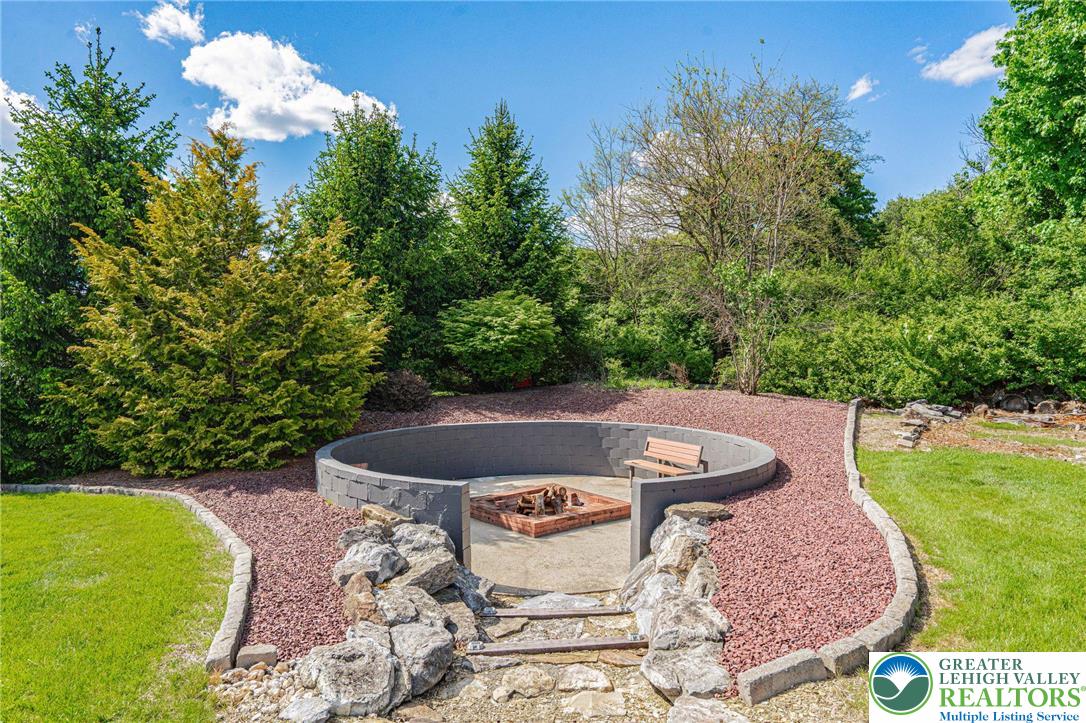 6551 Overlook Road Orefield, PA 18069 - Photo 67 of 82 a view of a swimming pool with a yard