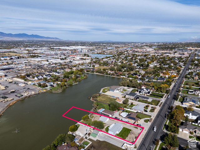 12958 South 300 East Draper, UT 84020 - Photo 5 of 38 Aerial perspective of suburban area featuring property boundaries highlighted and a water and mountain view