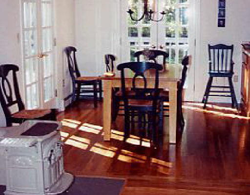 554 Ipswich Road Boxford, MA 01921 - Photo 3 of 6 a view of a dining room with furniture window and wooden floor