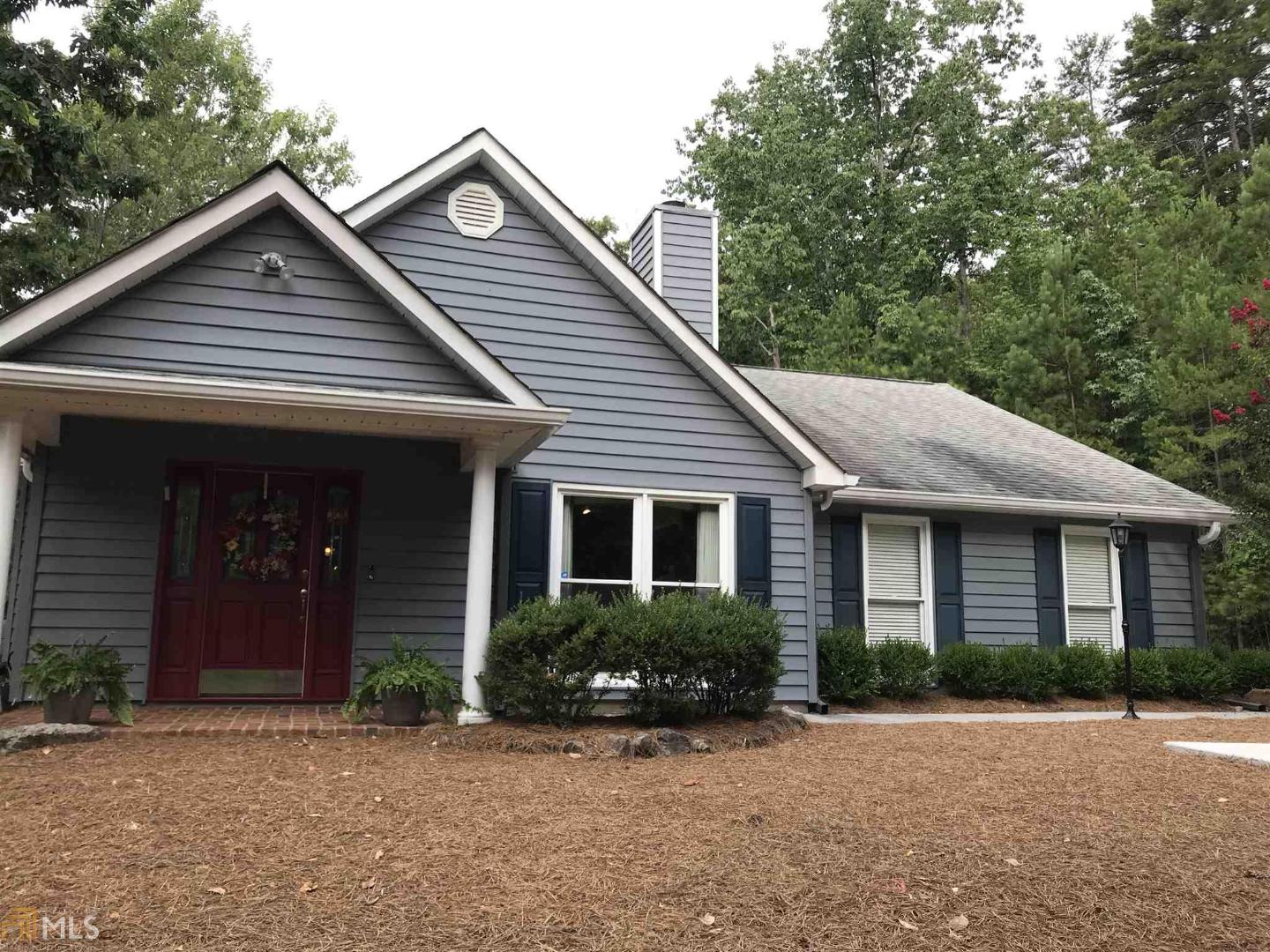 243 Whippoorwill Lane Southwest Rome, GA 30165 - Photo 1 of 1 a view of a house with a yard