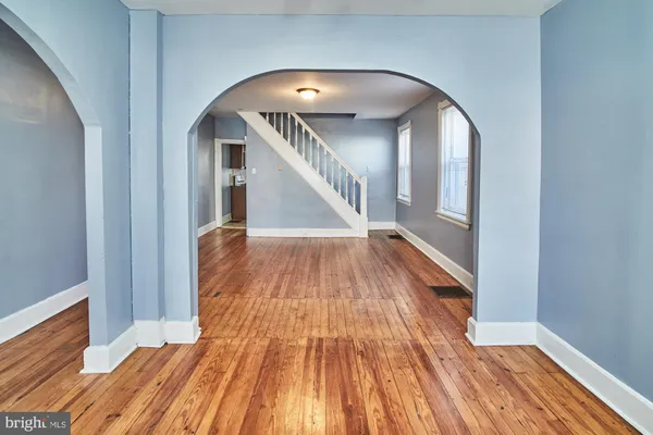 a view of entryway with wooden floor