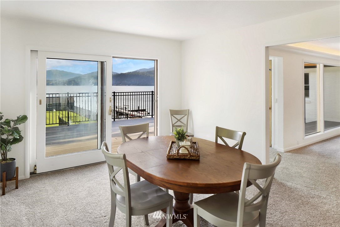 2301 North Shore Road Bellingham, WA 98226 - Photo 12 of 40 a view of a dining room with a table and chairs