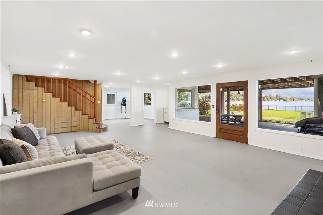 2301 North Shore Road Bellingham, WA 98226 - Photo 22 of 40 a living room with furniture and a large window