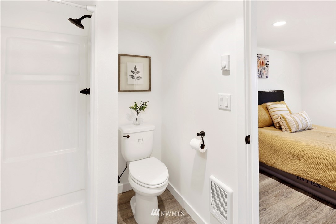 2301 North Shore Road Bellingham, WA 98226 - Photo 30 of 40 a bathroom with a toilet sink and shower