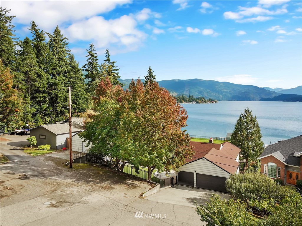 2301 North Shore Road Bellingham, WA 98226 - Photo 31 of 40 a view of a house with a yard and sitting area