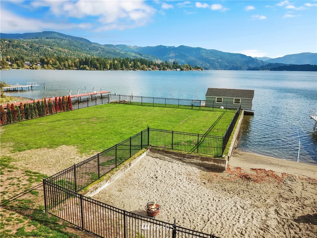 2301 North Shore Road Bellingham, WA 98226 - Photo 37 of 40 a view of a lake with a mountain in the background