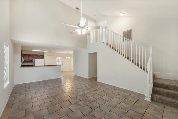 a view of a hallway view with staircase
