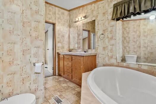 4210 Scronce Road Harrells, NC 28444 - Photo 14 of 28 a bathroom with a sink a toilet and shower