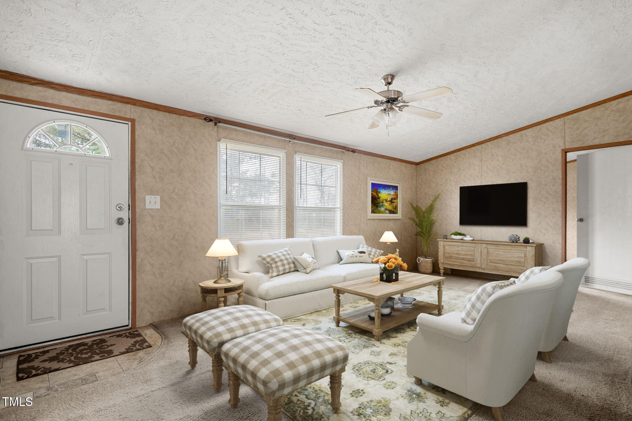 4210 Scronce Road Harrells, NC 28444 - Photo 5 of 28 a living room with furniture and a flat screen tv