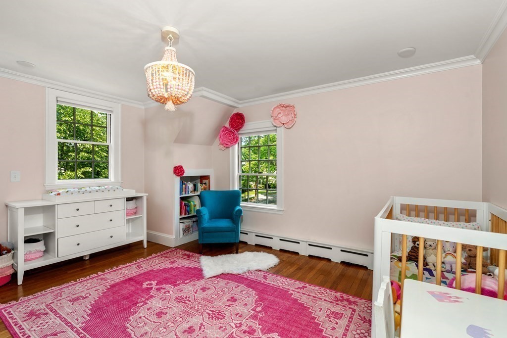 176 Dorset Road Newton, MA 02468 - Photo 21 of 27 a bedroom with a bed and a window