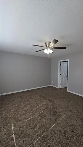 a view of a livingroom with a fan