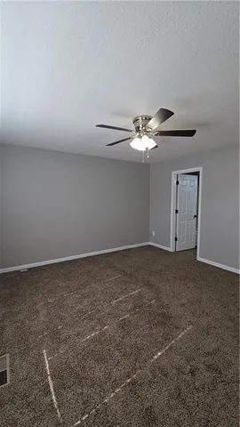 a view of a livingroom with a fan