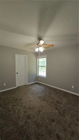 an empty room that has a window