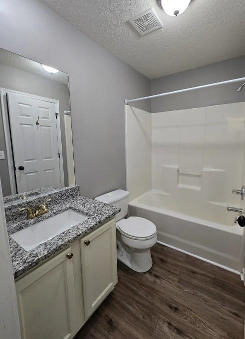 31 Corinth Road Cartersville, GA 30121 - Photo 23 of 35 a bathroom with a granite countertop sink toilet a large mirror and shower