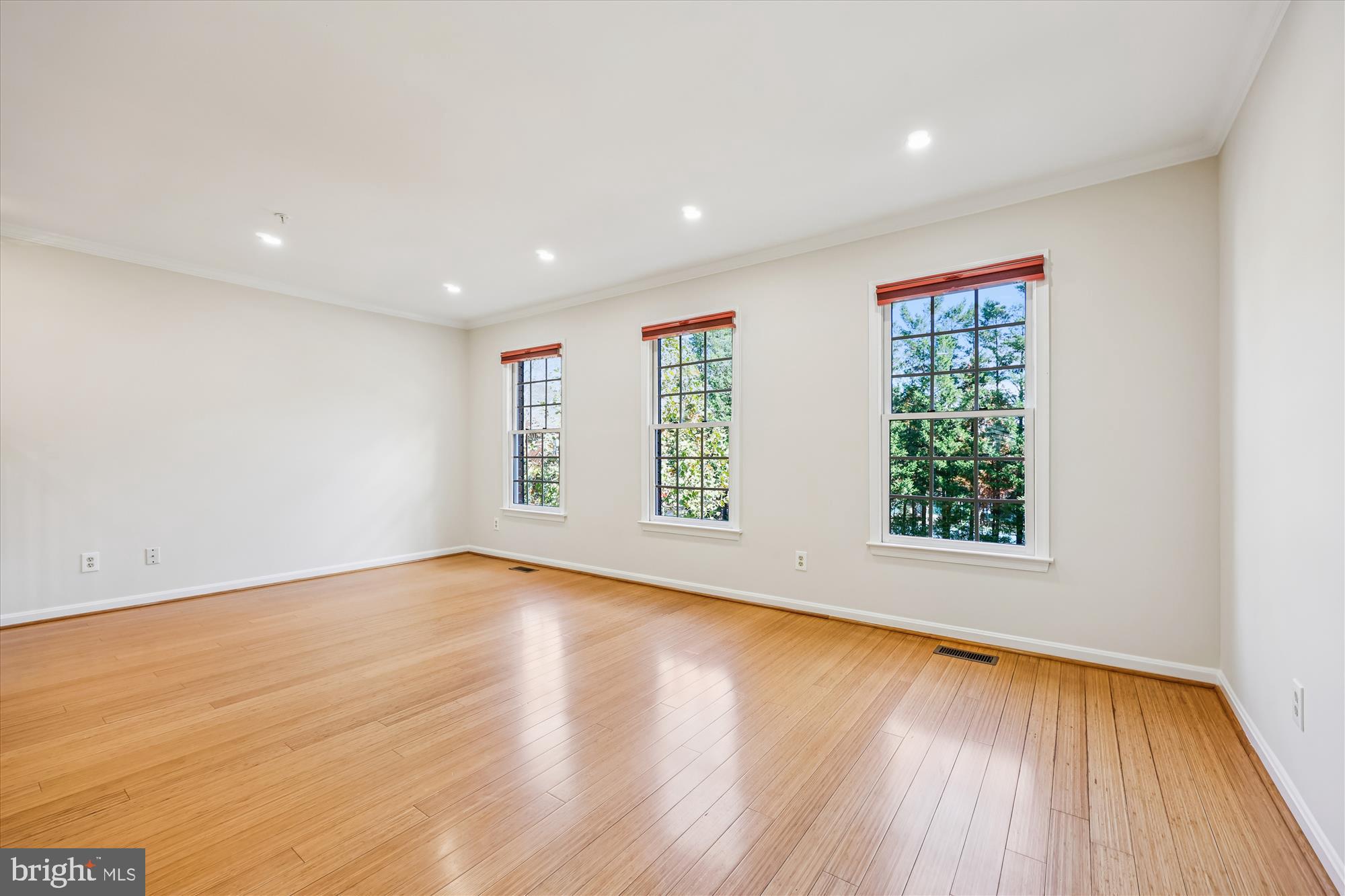536 Tschiffely Square Road Gaithersburg, MD 20878 - Photo 45 of 116 an empty room with wooden floor and windows