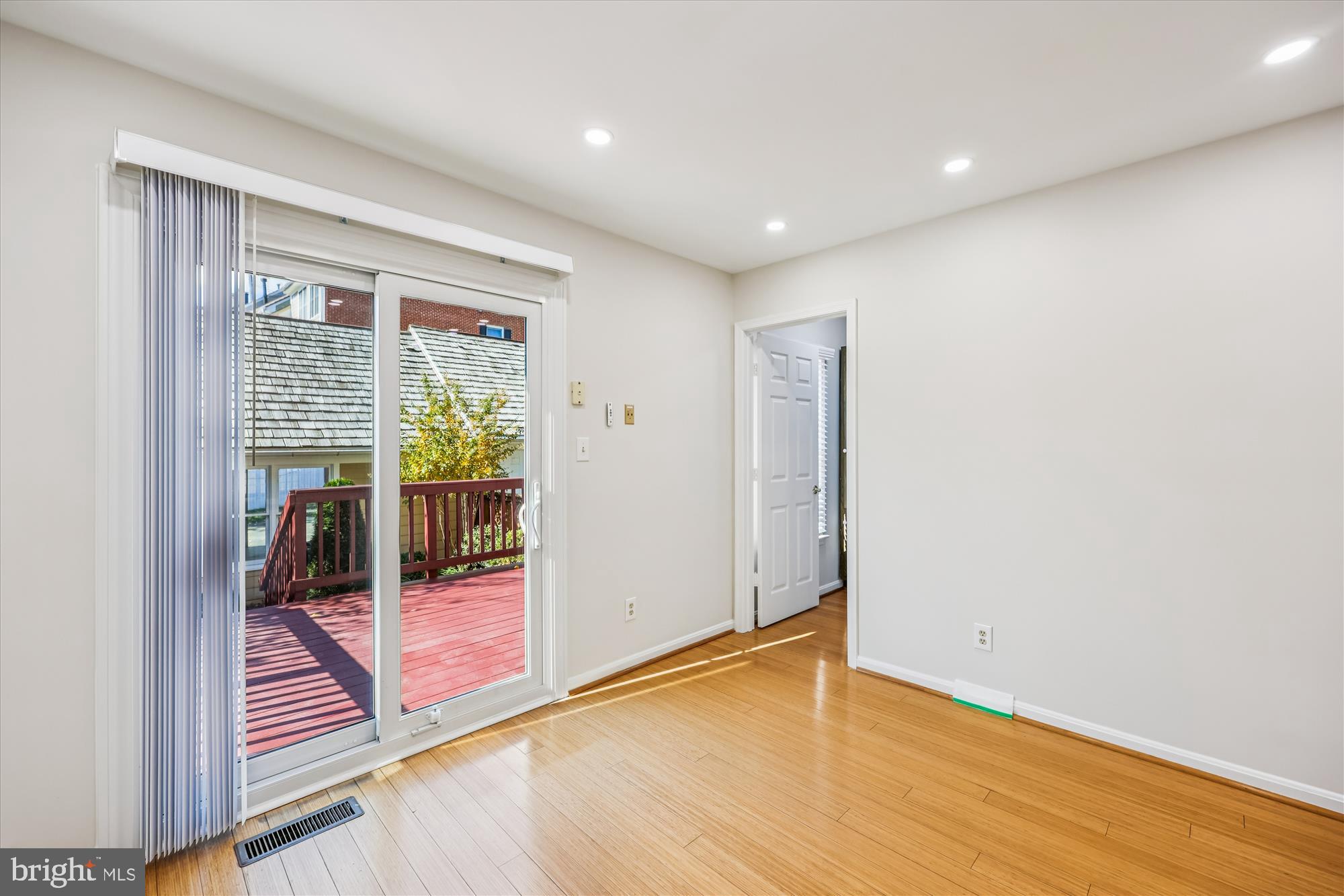 536 Tschiffely Square Road Gaithersburg, MD 20878 - Photo 58 of 116 a view of an empty room with wooden floor and a window