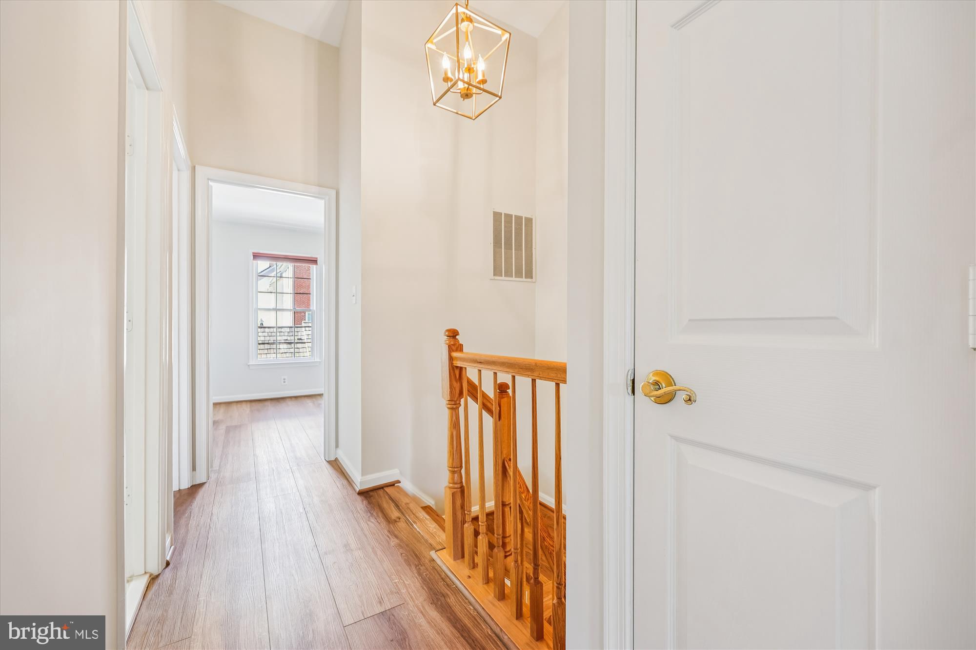 536 Tschiffely Square Road Gaithersburg, MD 20878 - Photo 61 of 116 a view of a hallway with wooden floor