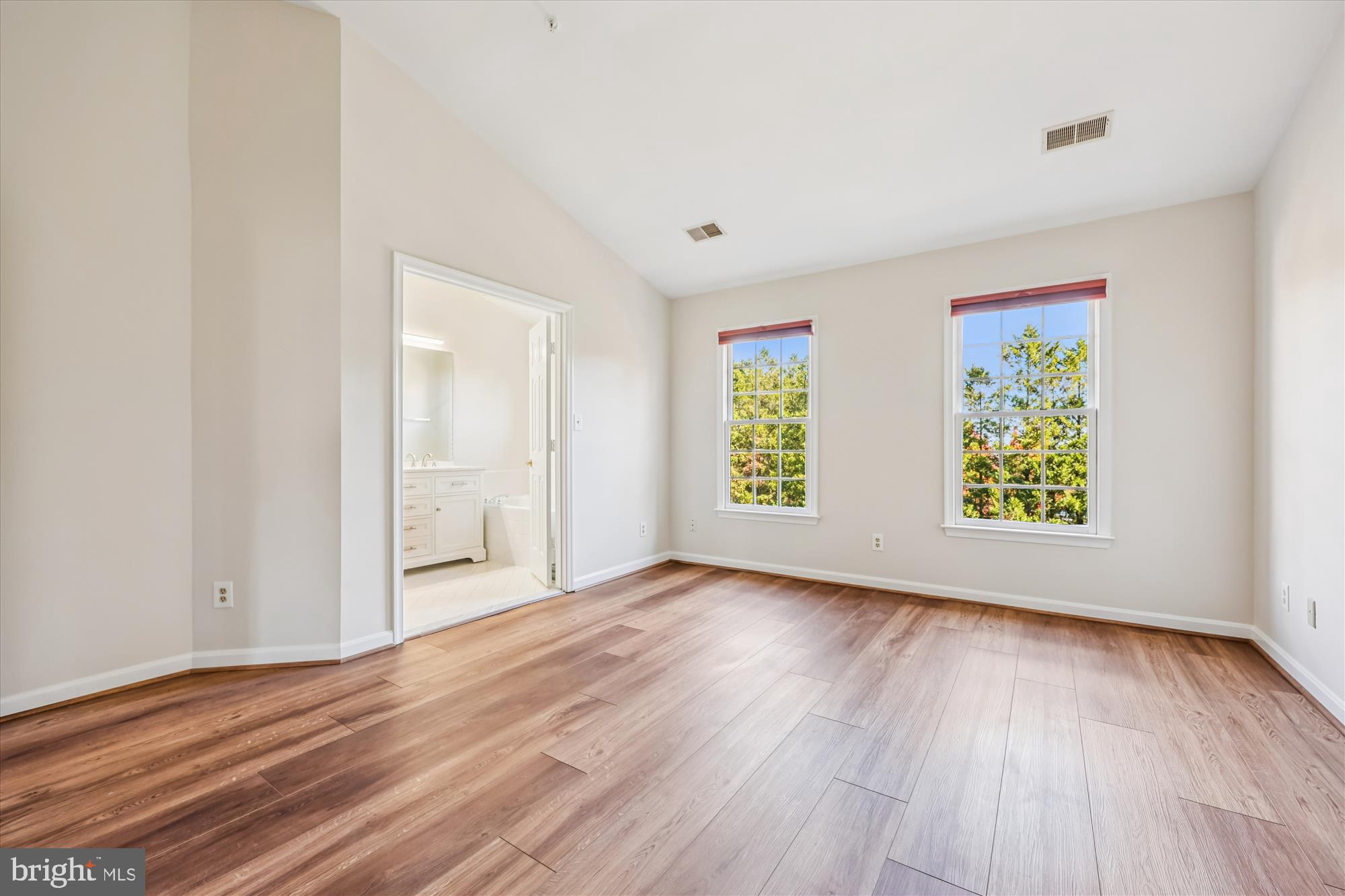 536 Tschiffely Square Road Gaithersburg, MD 20878 - Photo 63 of 116 an empty room with wooden floor and window