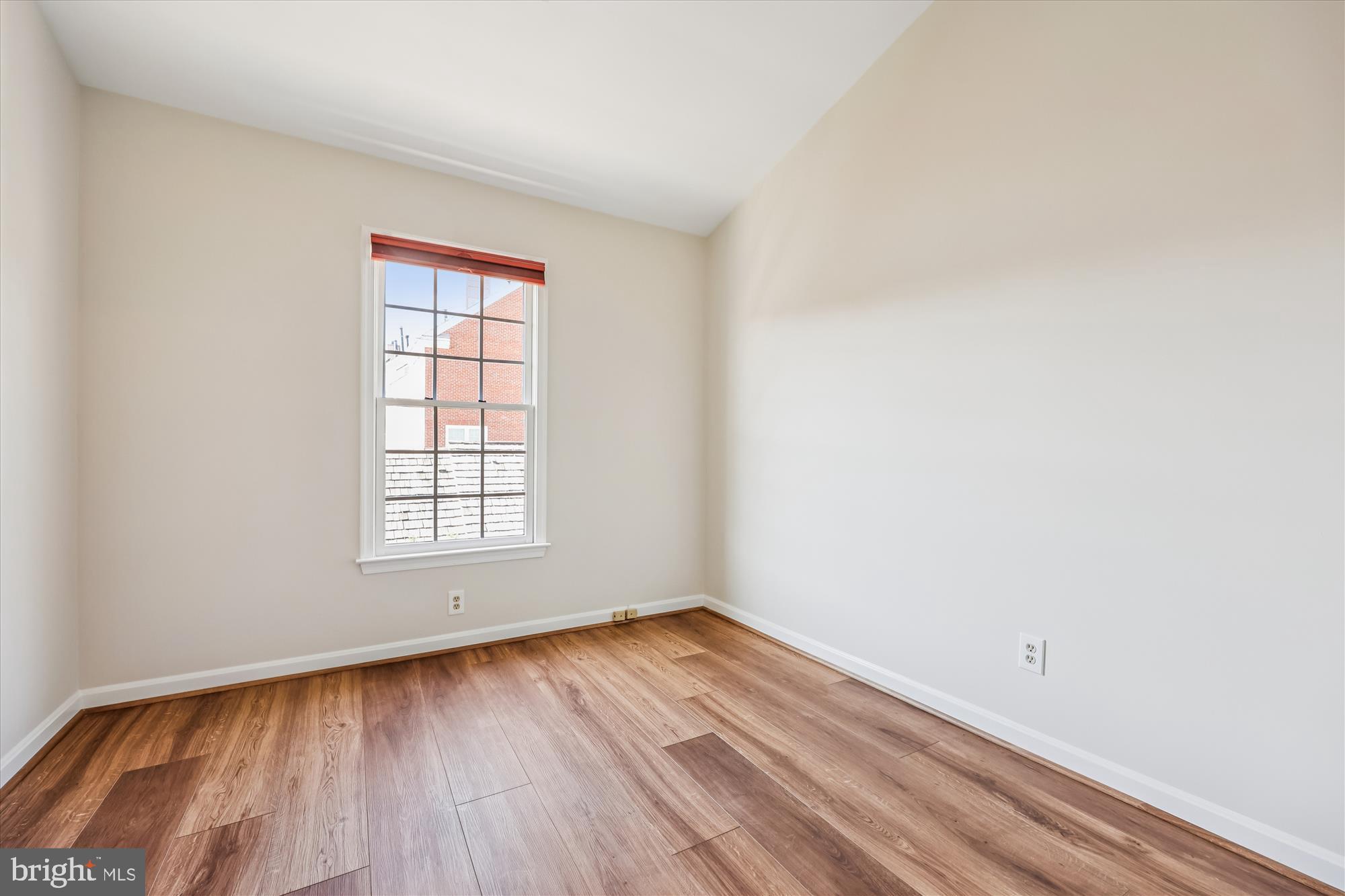 536 Tschiffely Square Road Gaithersburg, MD 20878 - Photo 73 of 116 an empty room with wooden floor and windows