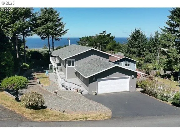 a house with trees in the background