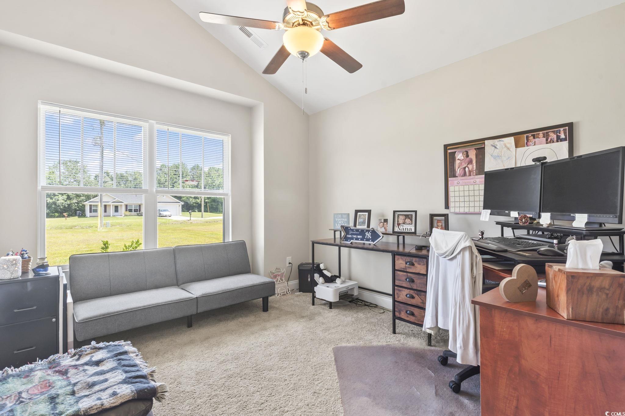 1170 Daisy Road Loris, SC 29569 - Photo 17 of 35 Carpeted office space with vaulted ceiling and ceiling fan