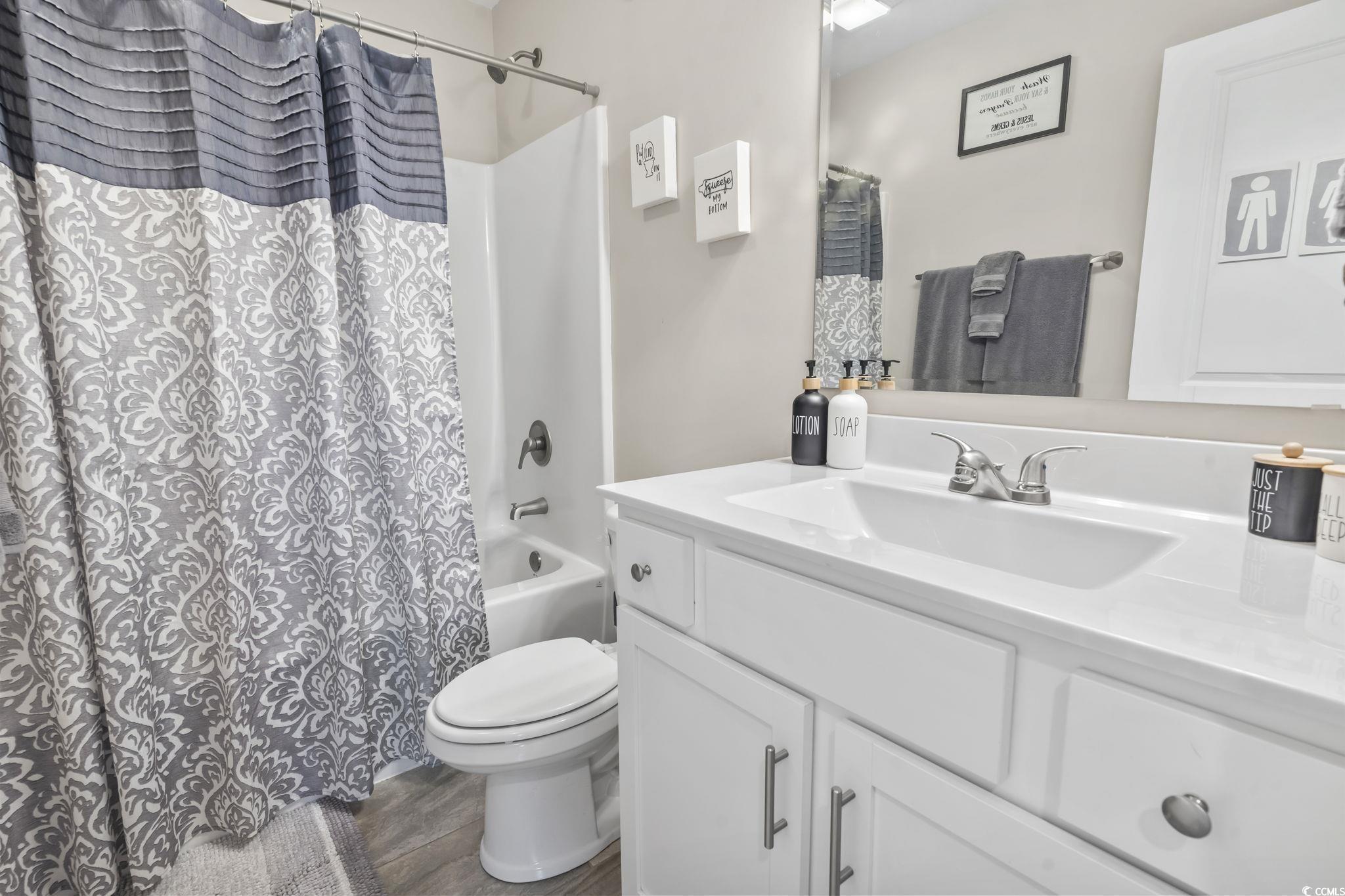 1170 Daisy Road Loris, SC 29569 - Photo 24 of 35 Full bath with vanity and shower / bath combo with shower curtain