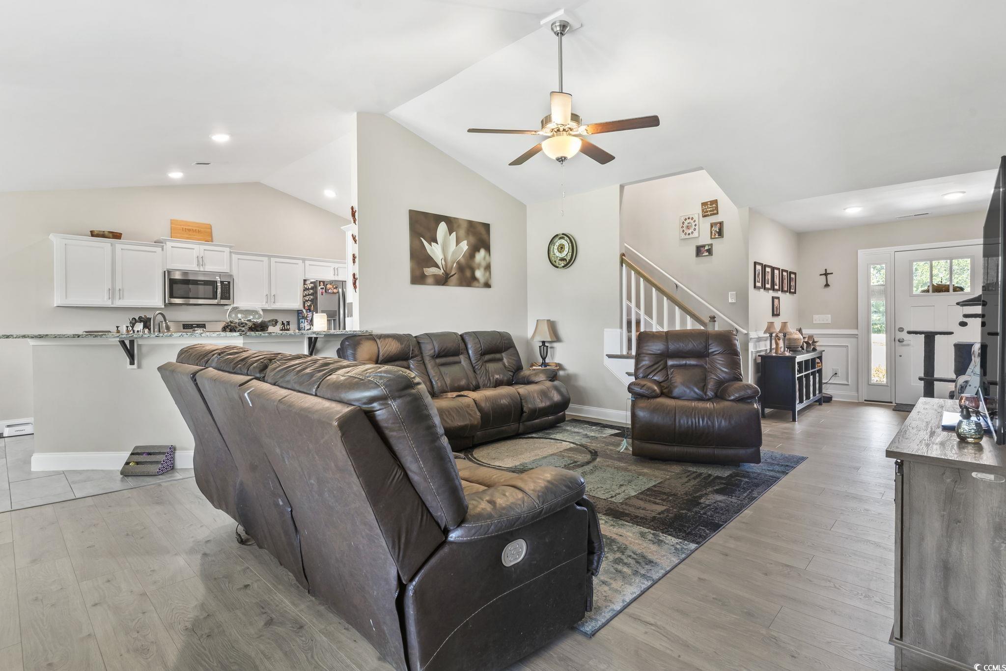 1170 Daisy Road Loris, SC 29569 - Photo 7 of 35 Living room featuring stairs, lofted ceiling, ceiling fan, light wood finished floors, and recessed lighting