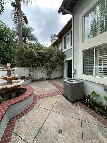 a front view of a house with outdoor space