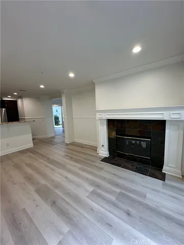 a view of kitchen and a fireplace