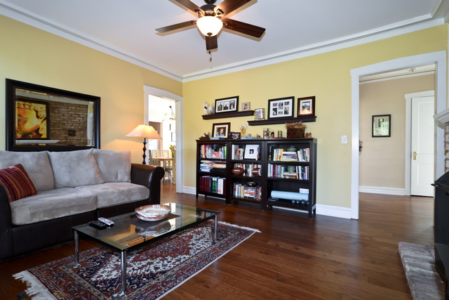 751 West Brompton Avenue, Unit 2E Chicago, IL 60657 - Photo 4 of 10 a living room with furniture and wooden floor