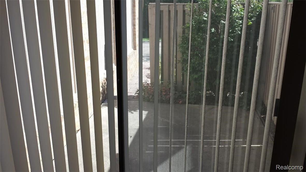 722 Oak Brook Ridge Drive, Unit 100 Rochester, MI 48307 - Photo 16 of 19 patio.jpg