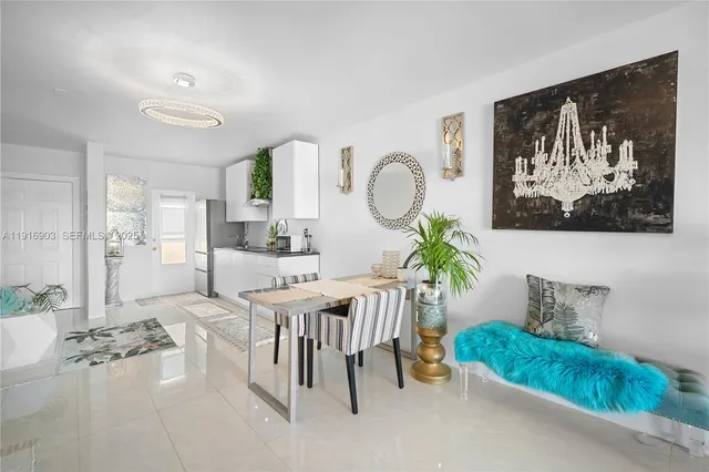 a vase of flowers sitting on a table field