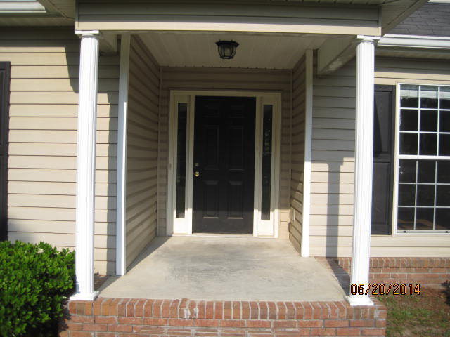 6336 Skipperton Road Macon, GA 31216 - Photo 3 of 18 a front view of a house with a door