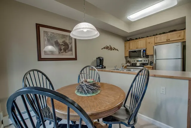a view of a dining room with furniture