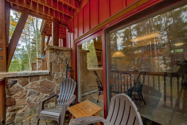 a view of balcony with furniture