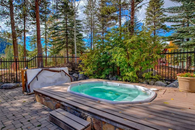 a view of a backyard with sitting area