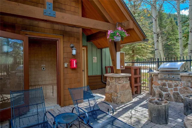 a view of a chairs and table in the patio